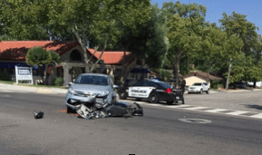 Picture of motorcycle hit by car