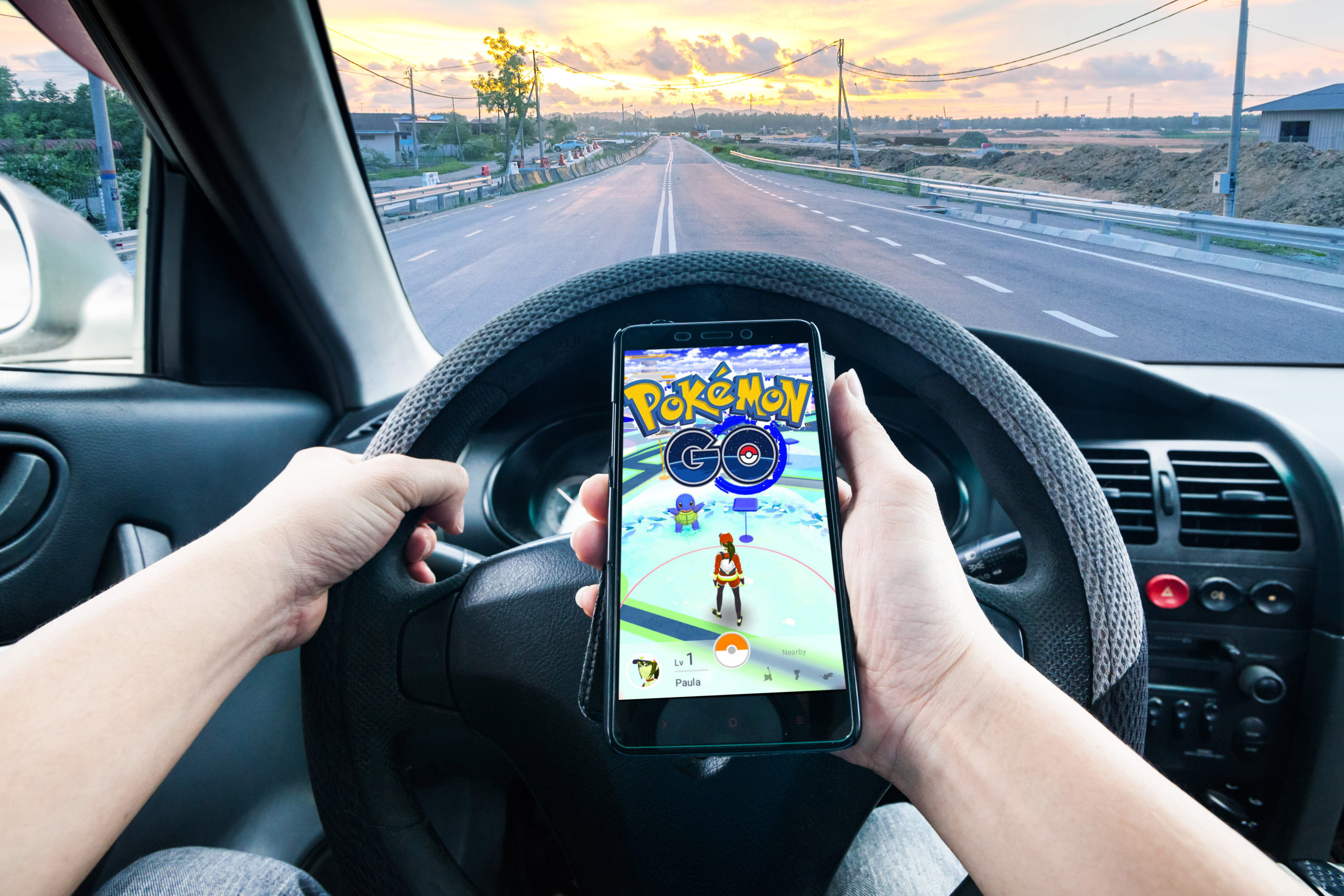 Picture of Person using cellphone while driving