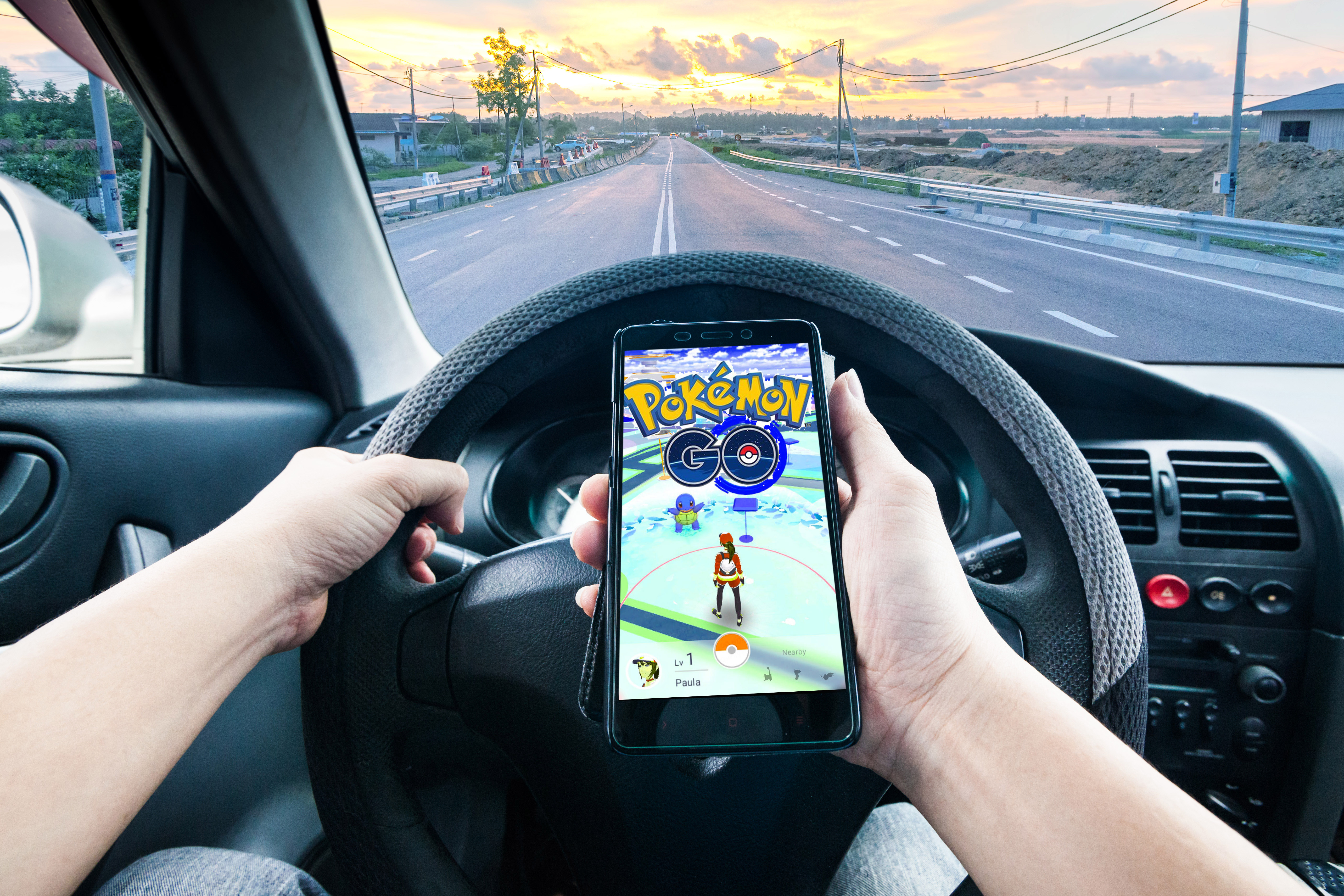 Picture of Person using cellphone while driving