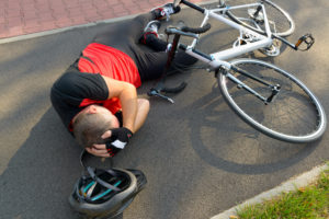 Photo of a Man Right After a Bicycle Accident