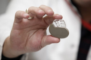 Photo of Someone Holding a Defective Pacemaker