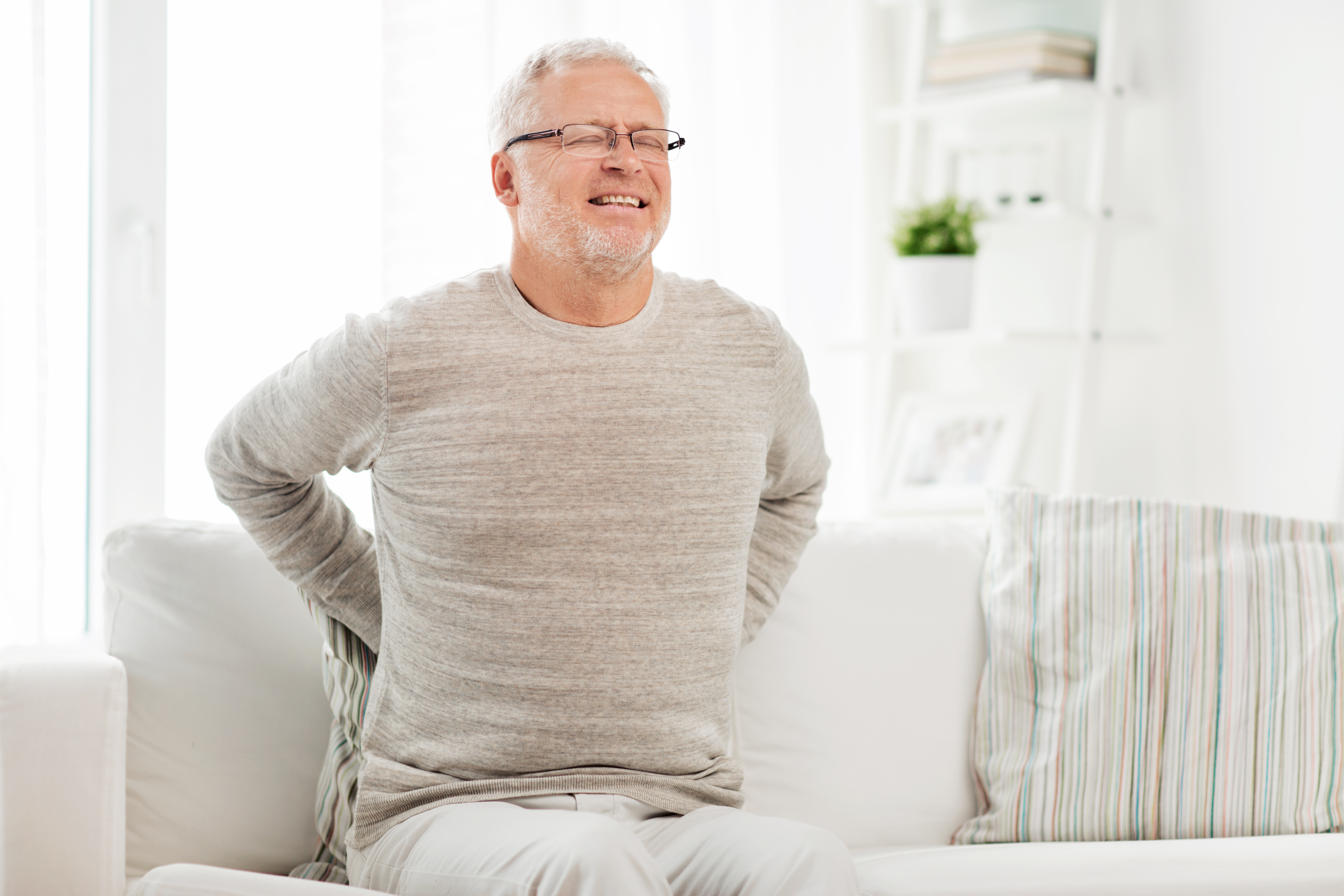 Photo of a Man in Pain Due to a Back Injury